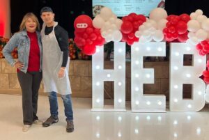 Claudia Lopez Cruz, volunteer extraordinaire who coordinates Feast of Sharing entertainment, pauses to take a quick picture with her brother Hector Cruz, who volunteers with his employer Val Verde Regional Medical Center. (Courtesy photo)